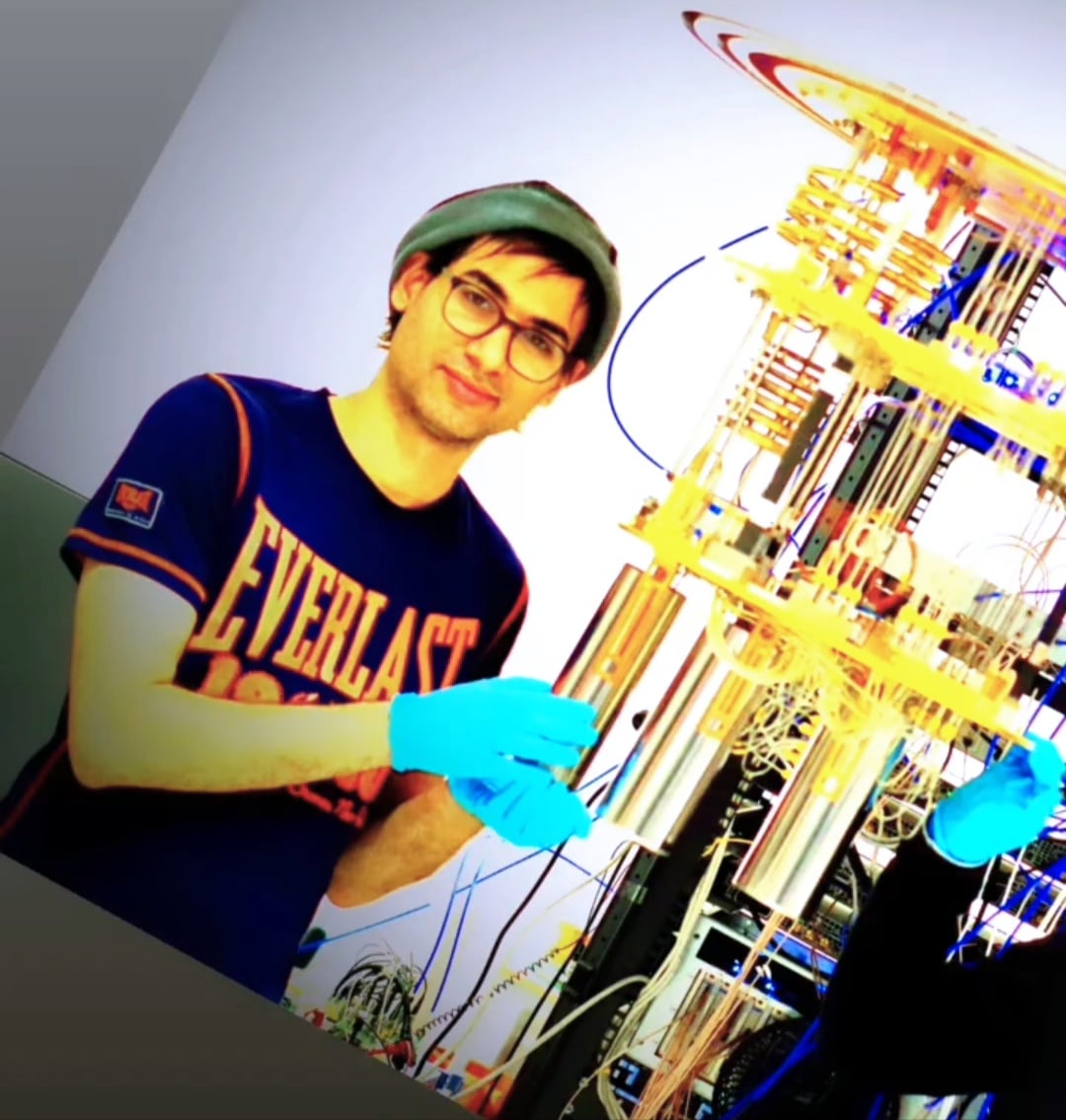 A man holding a packaged quantum processor