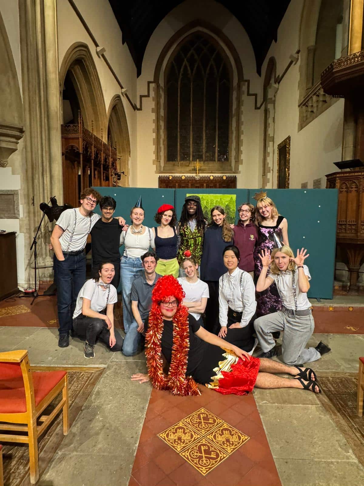 a group of young actors posing for a photo