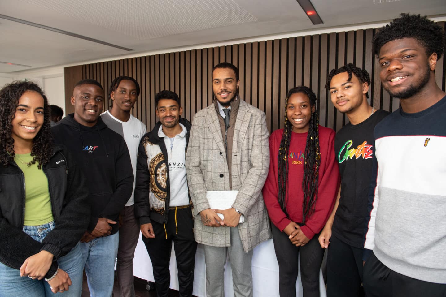 AJ Tracey with students