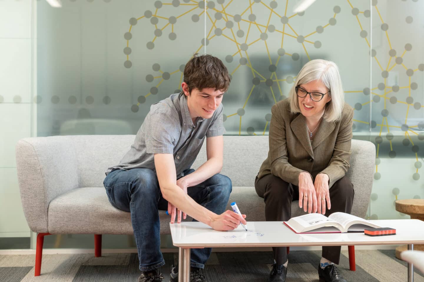 Christl Donnelly and a student in a meeting