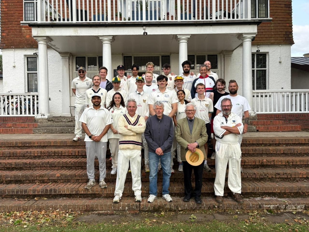 A group of people in cricket attire