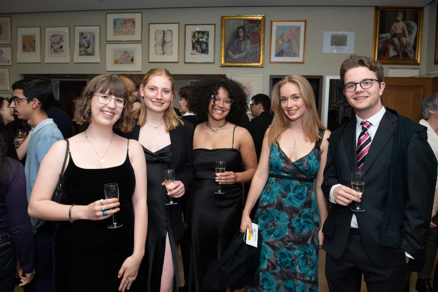 Five people at a formal event