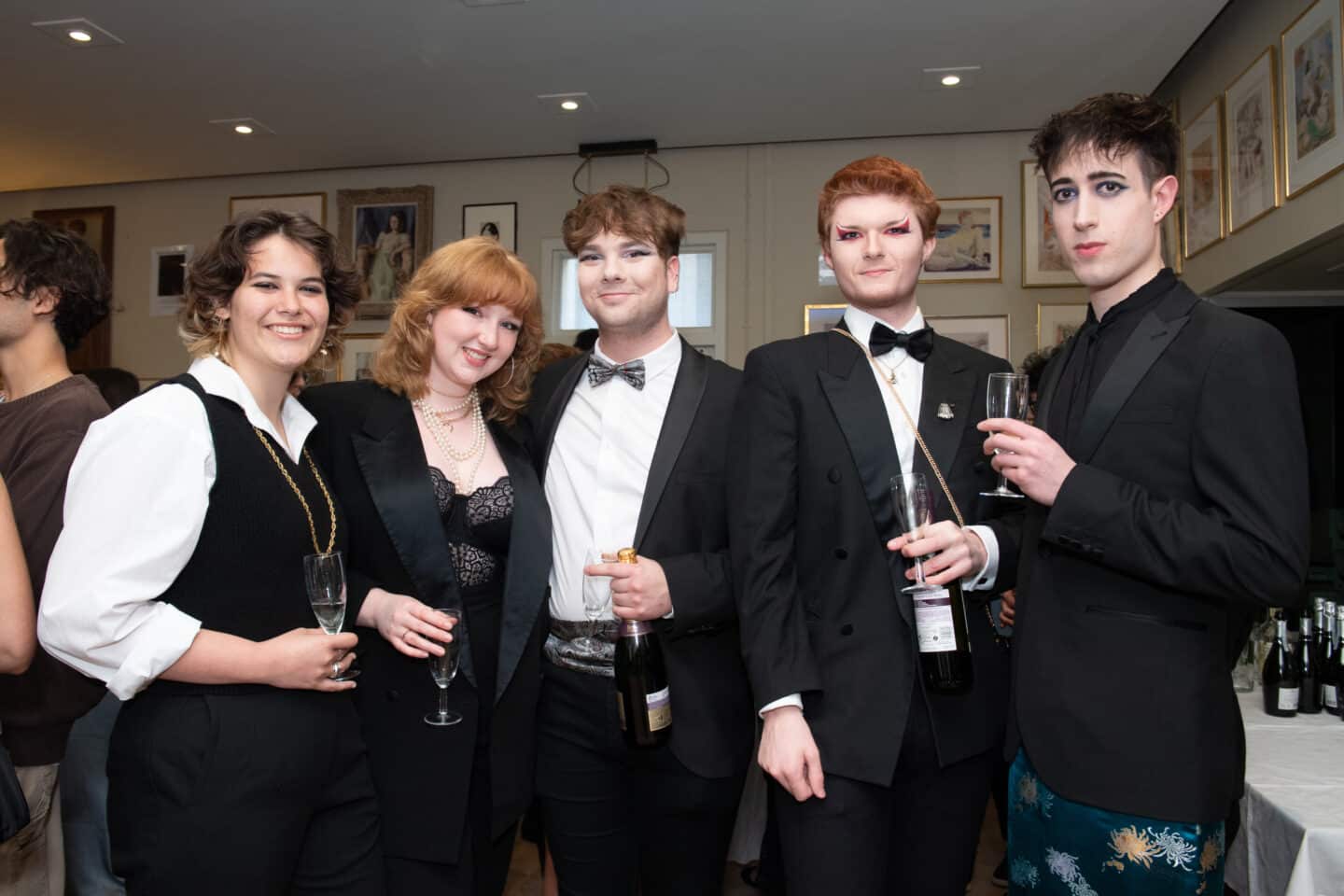 Five people at a formal event