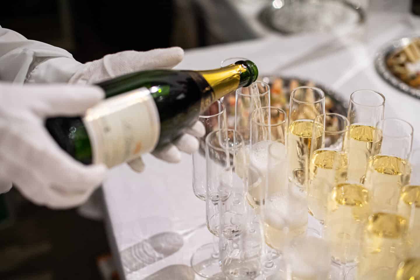 Champagne glasses being filled