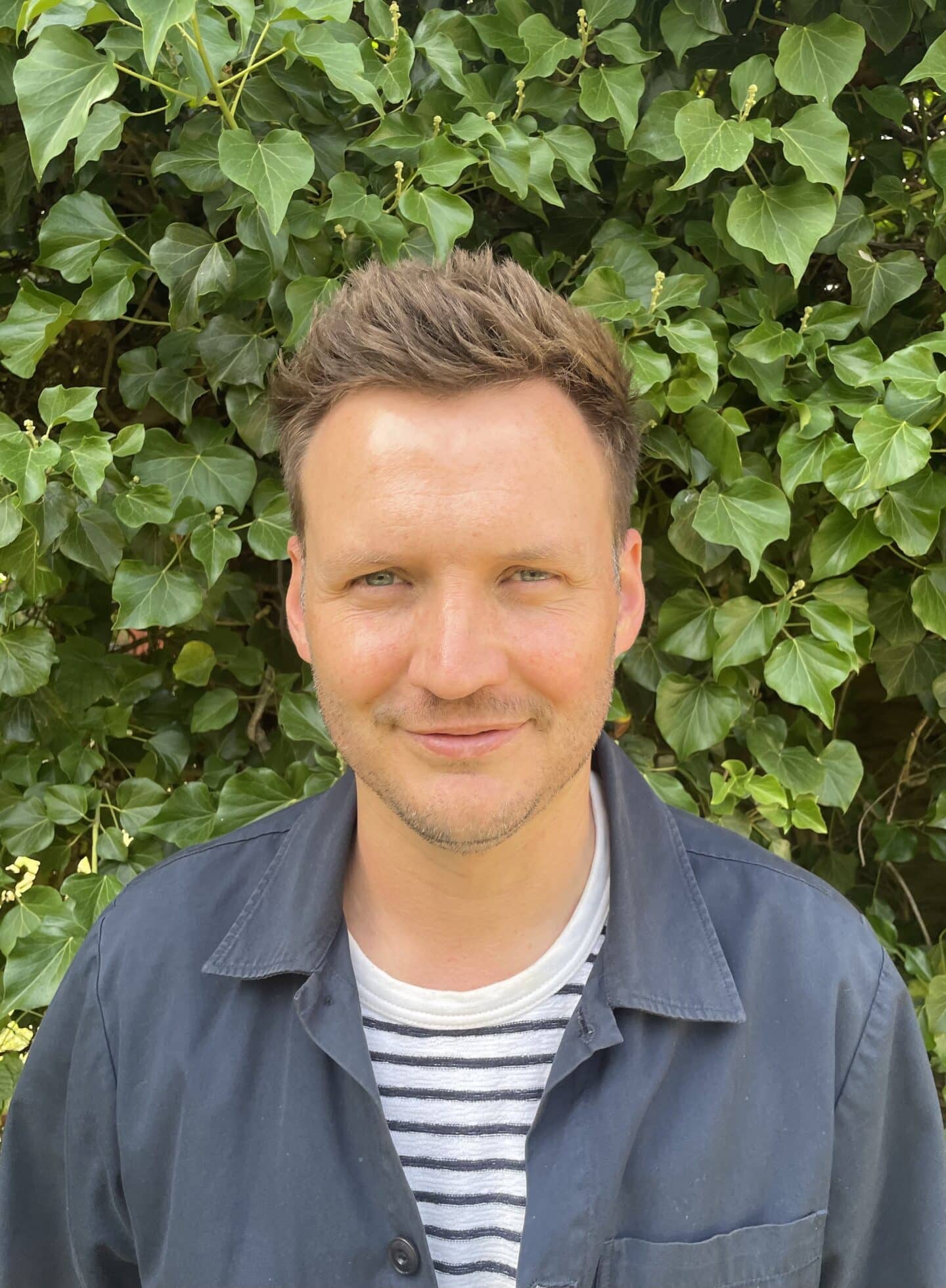 A headshot of a man