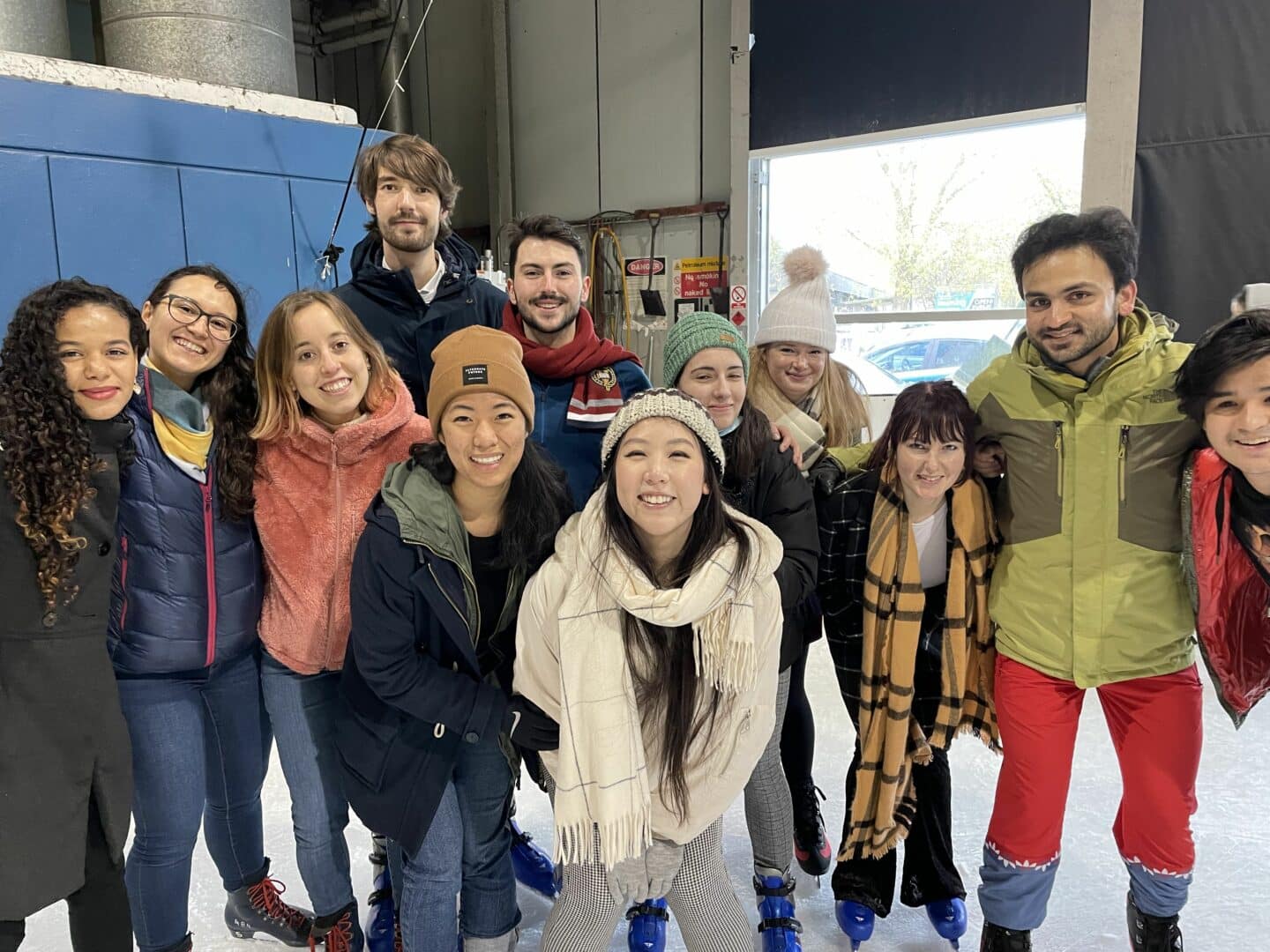 A group of people ice skating