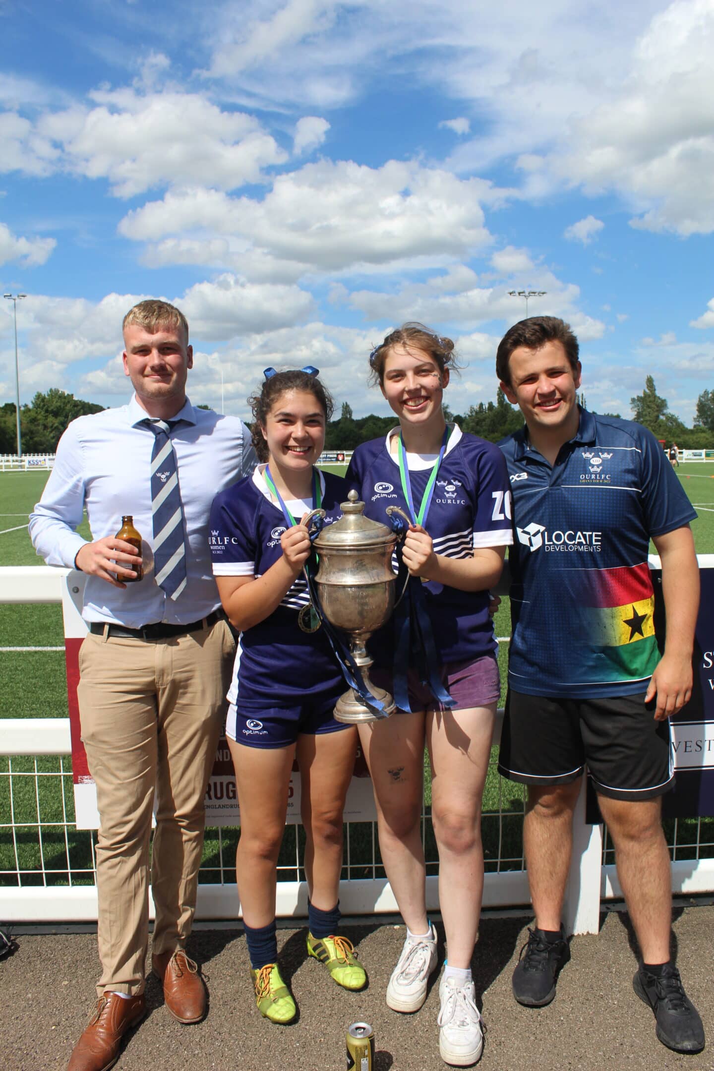 Four St Peter's students pose with the Women's Rugby League Varsity Cup.