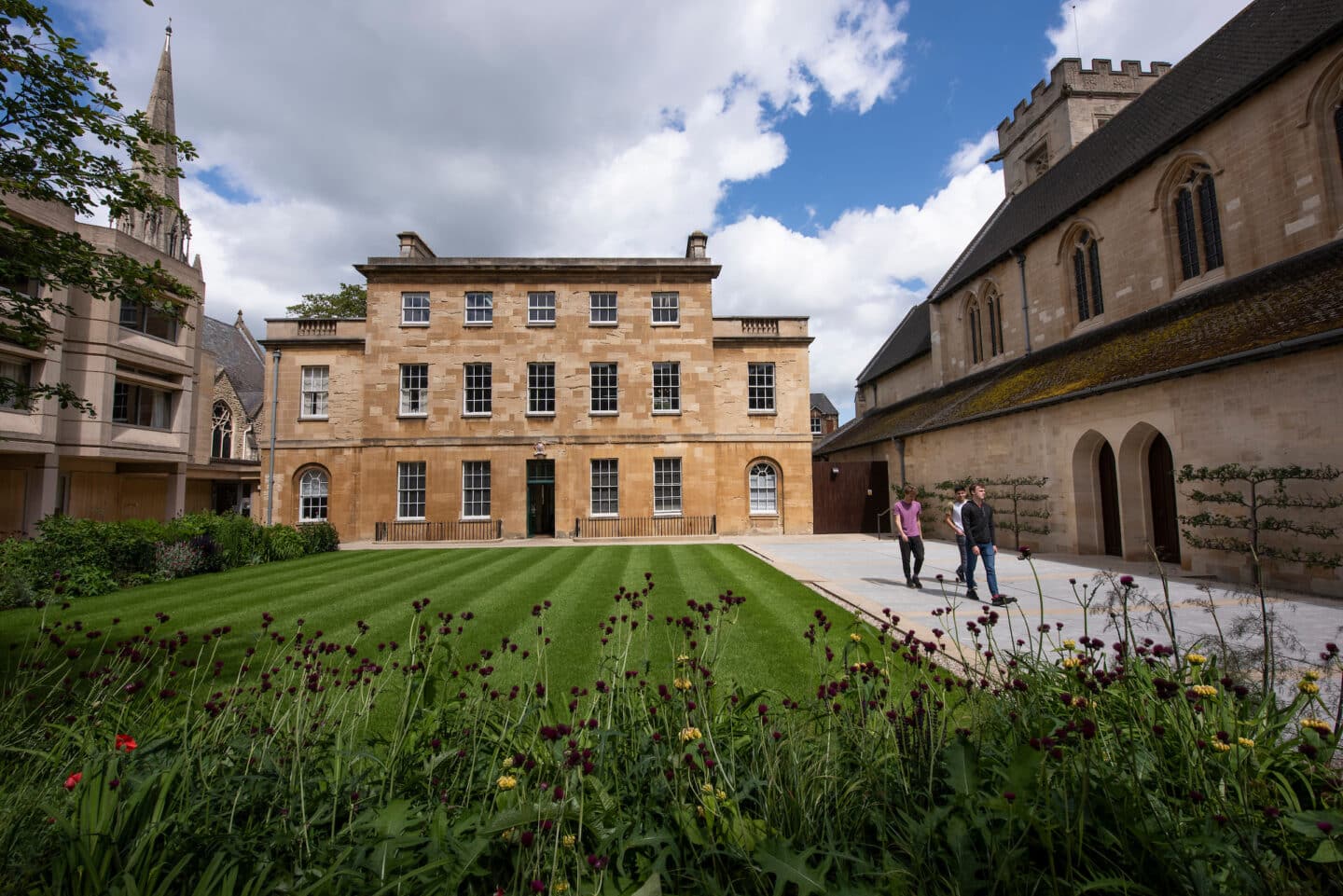 Students walking in a College quad