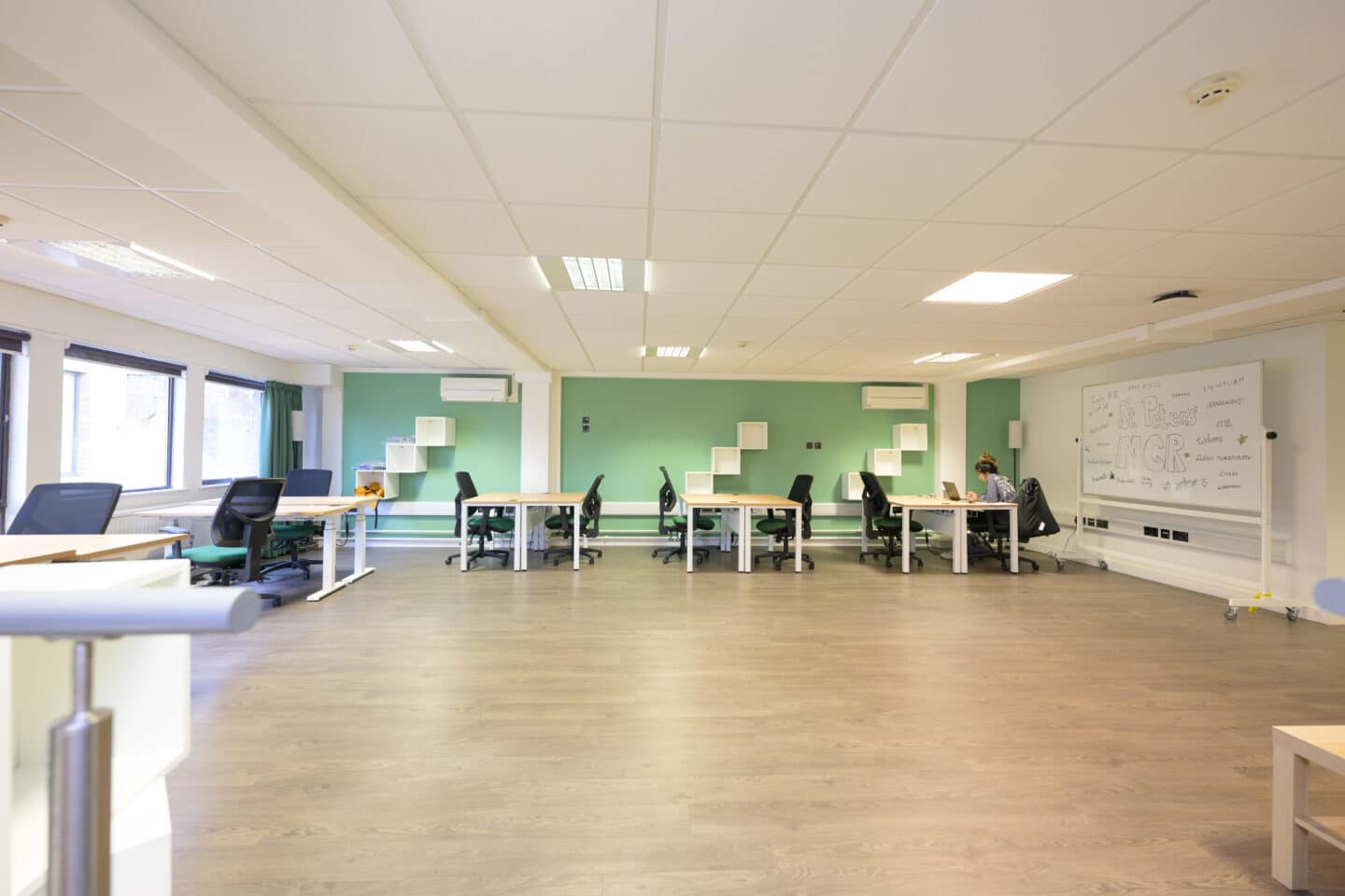 a large room with desks.