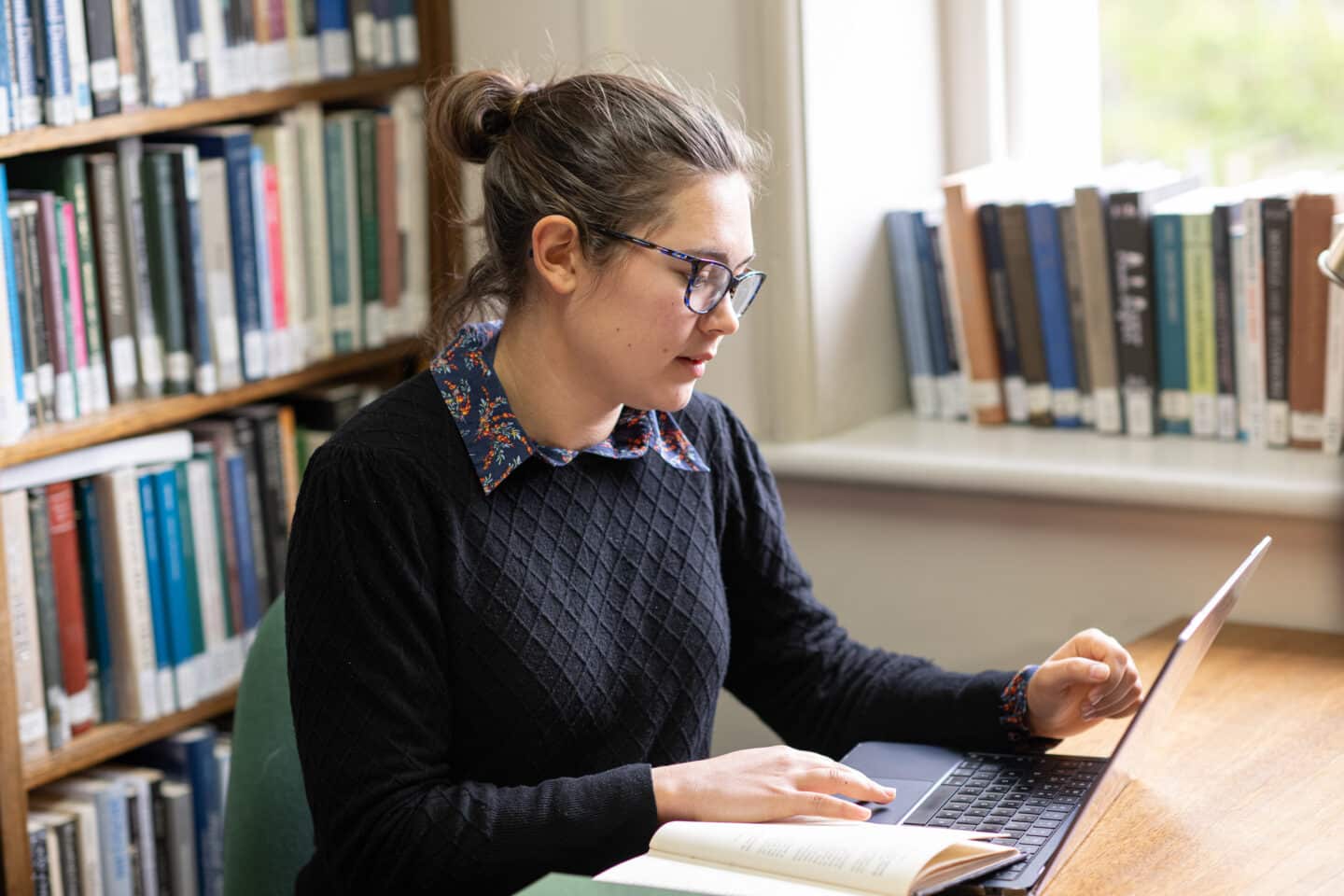 A person looking at a computer