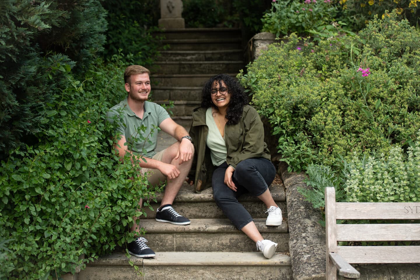 Two students smiling