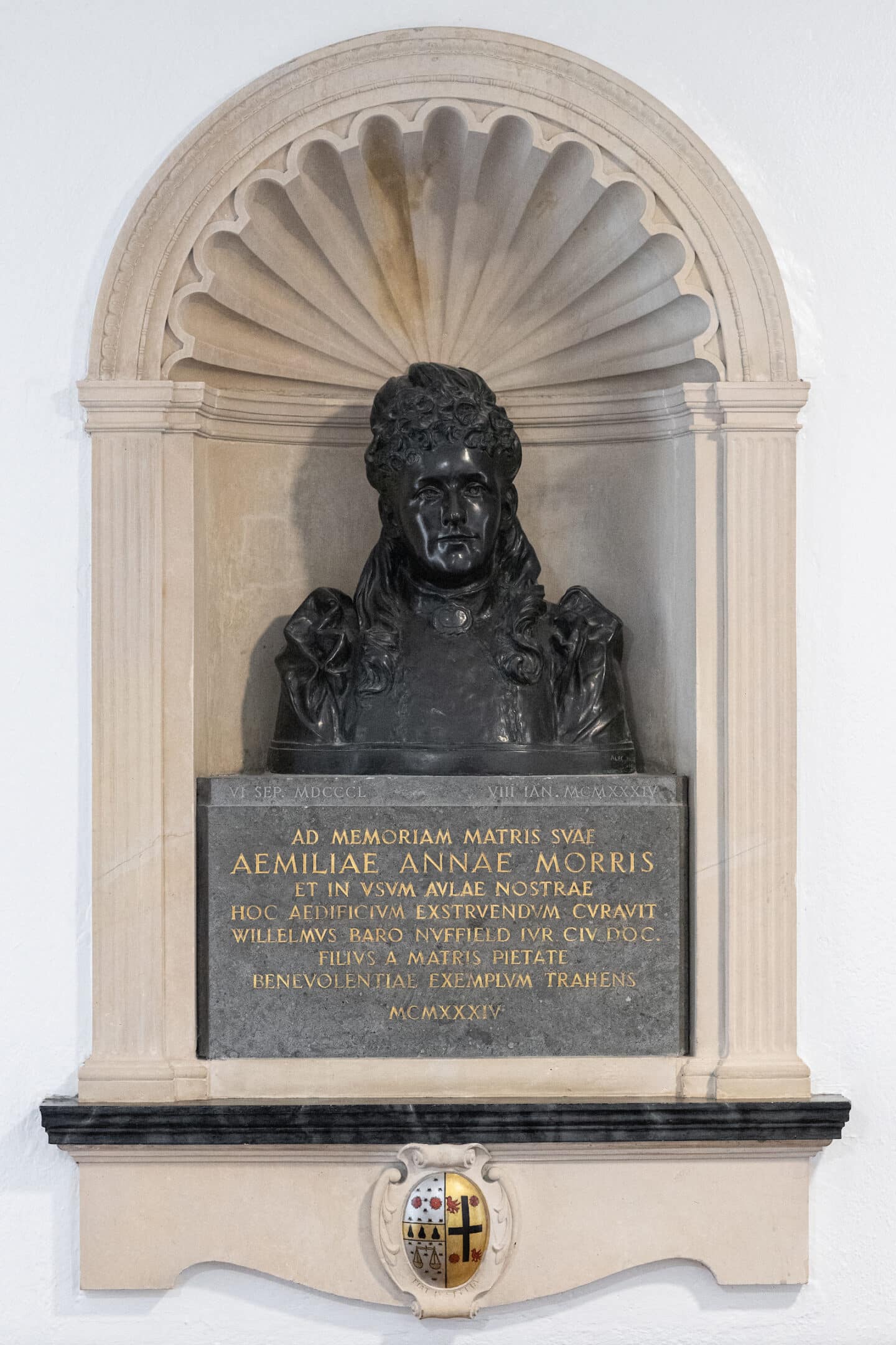 A bust of a woman with a Latin inscription