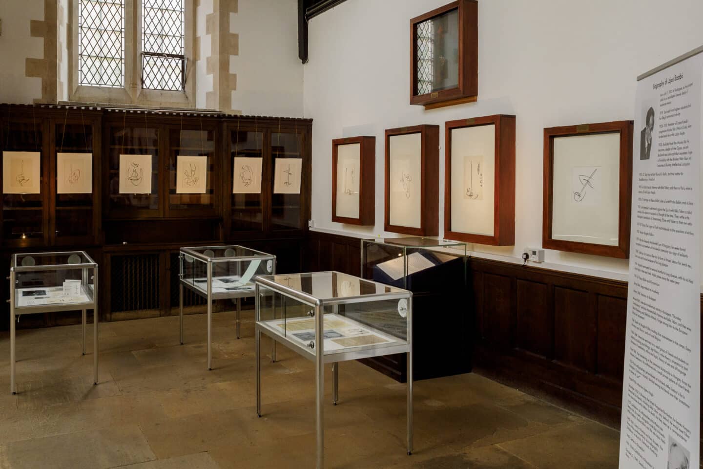 Installation view of artworks on paper in the College chapel