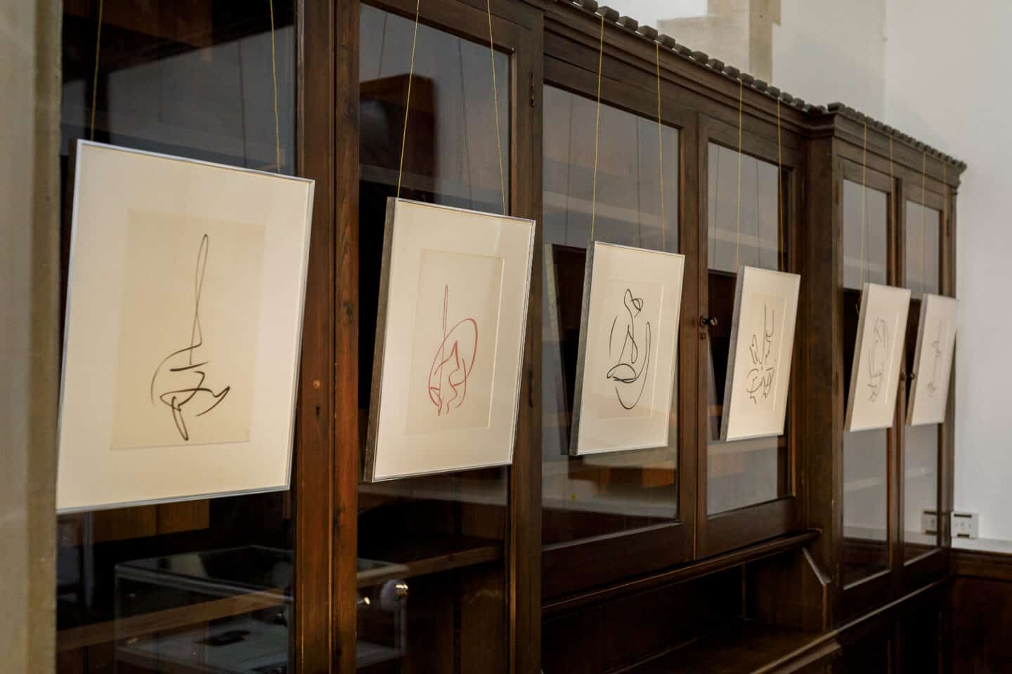 Installation view of artworks on paper in the College chapel