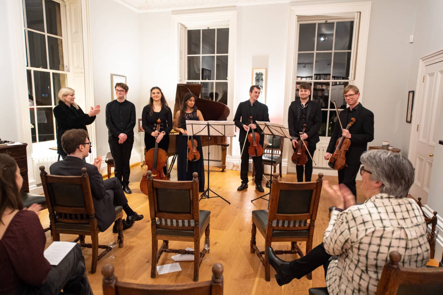 A group of instrumentalists at a recital.