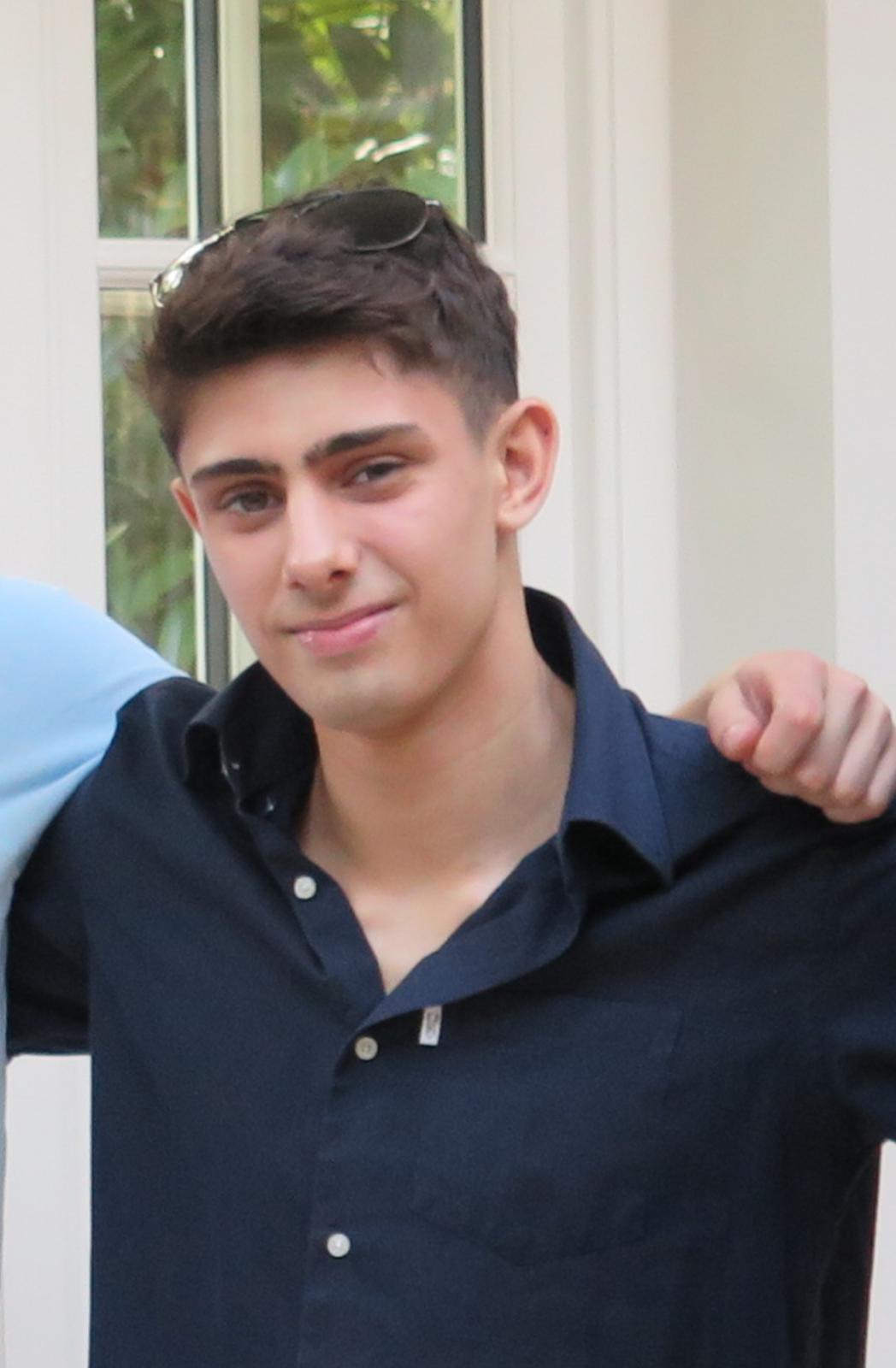 A student in a blue shirt