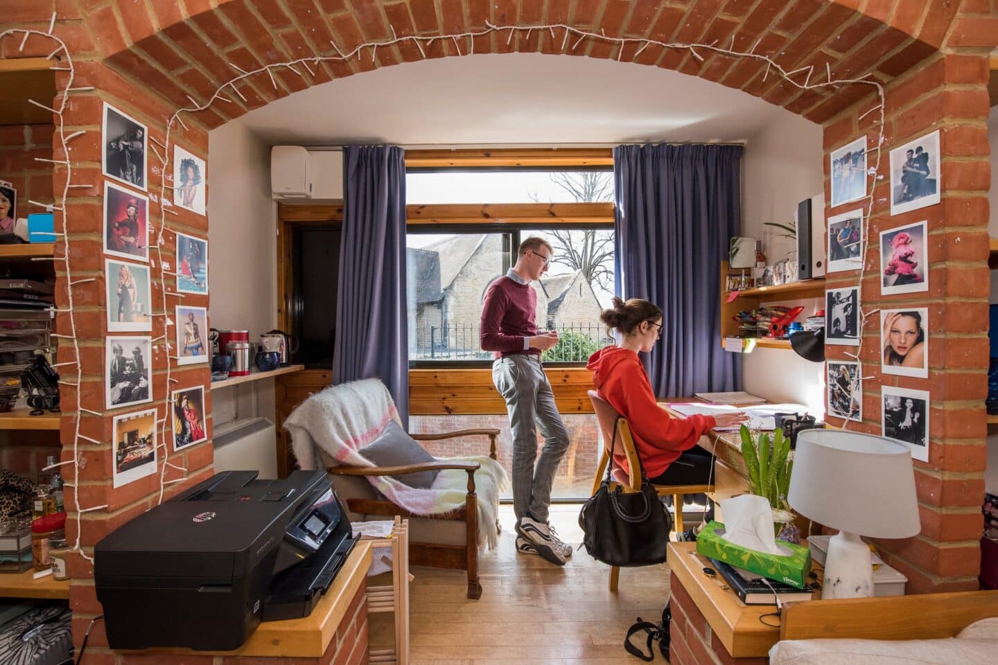 two students studying in a nicely decorated student accommodation room