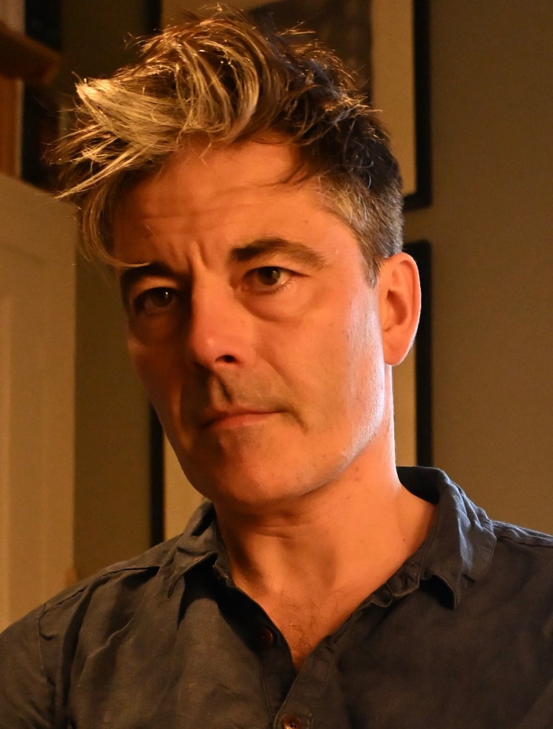 A headshot of a man