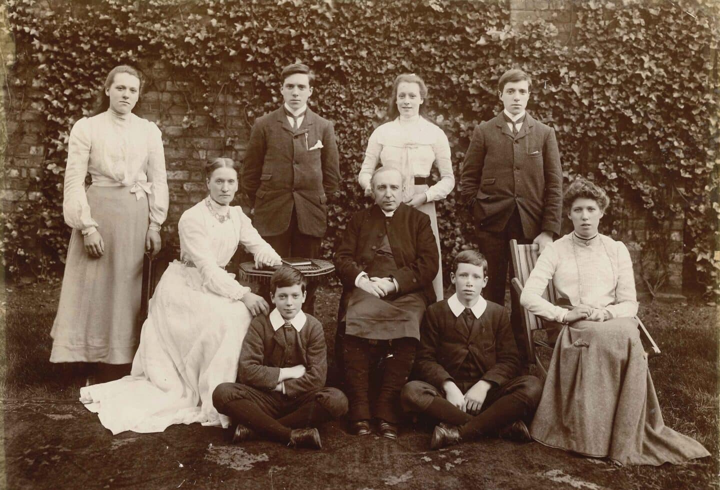 vintage photograph of a family of nine people