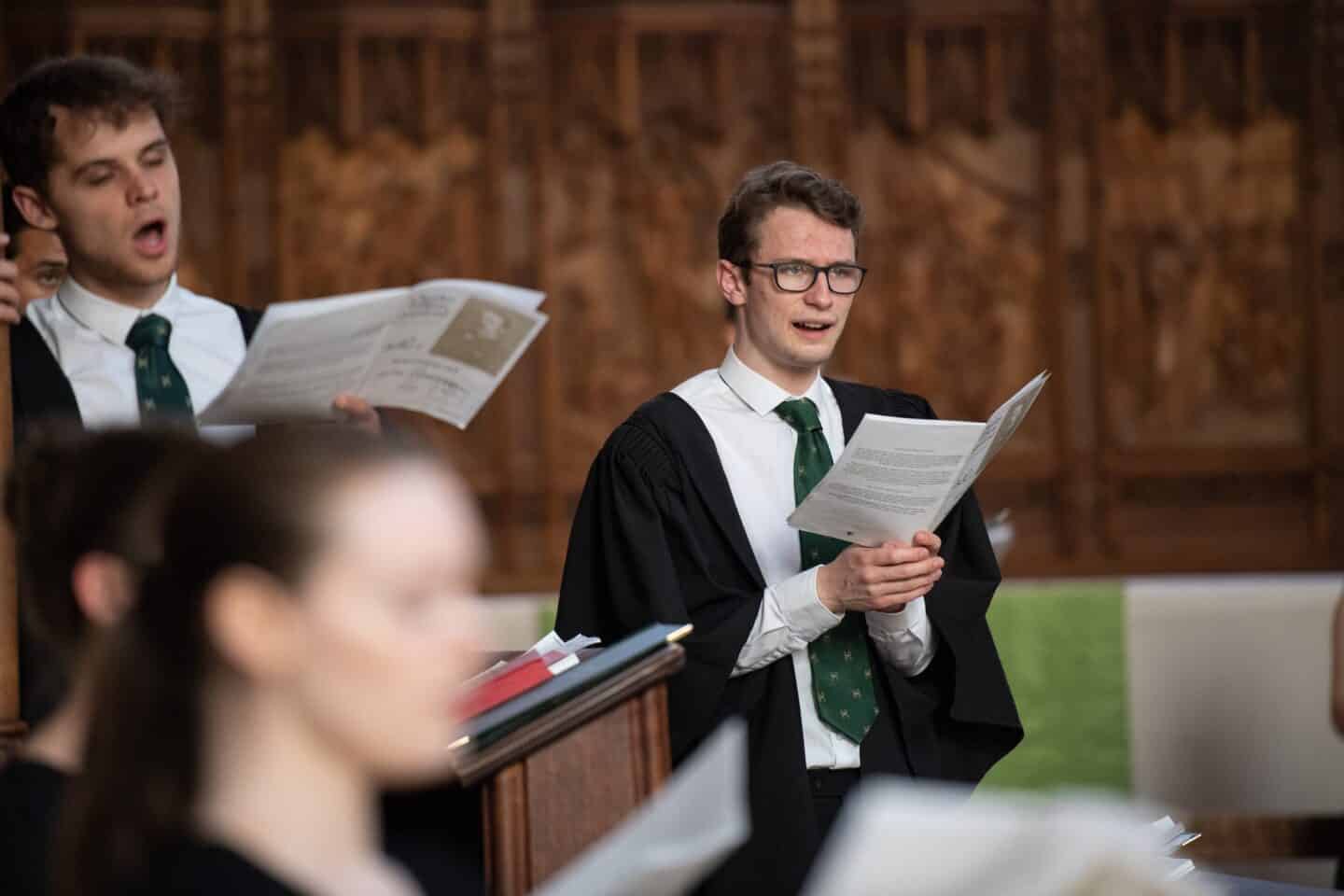 a person singing in a choir