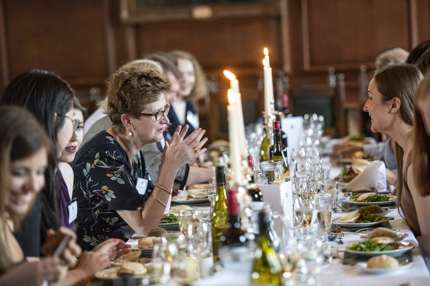 a group of people enjoying a formal meal