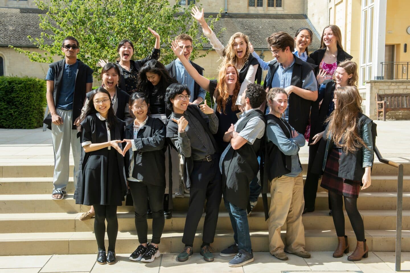 a group of students smiling and posing for a photo